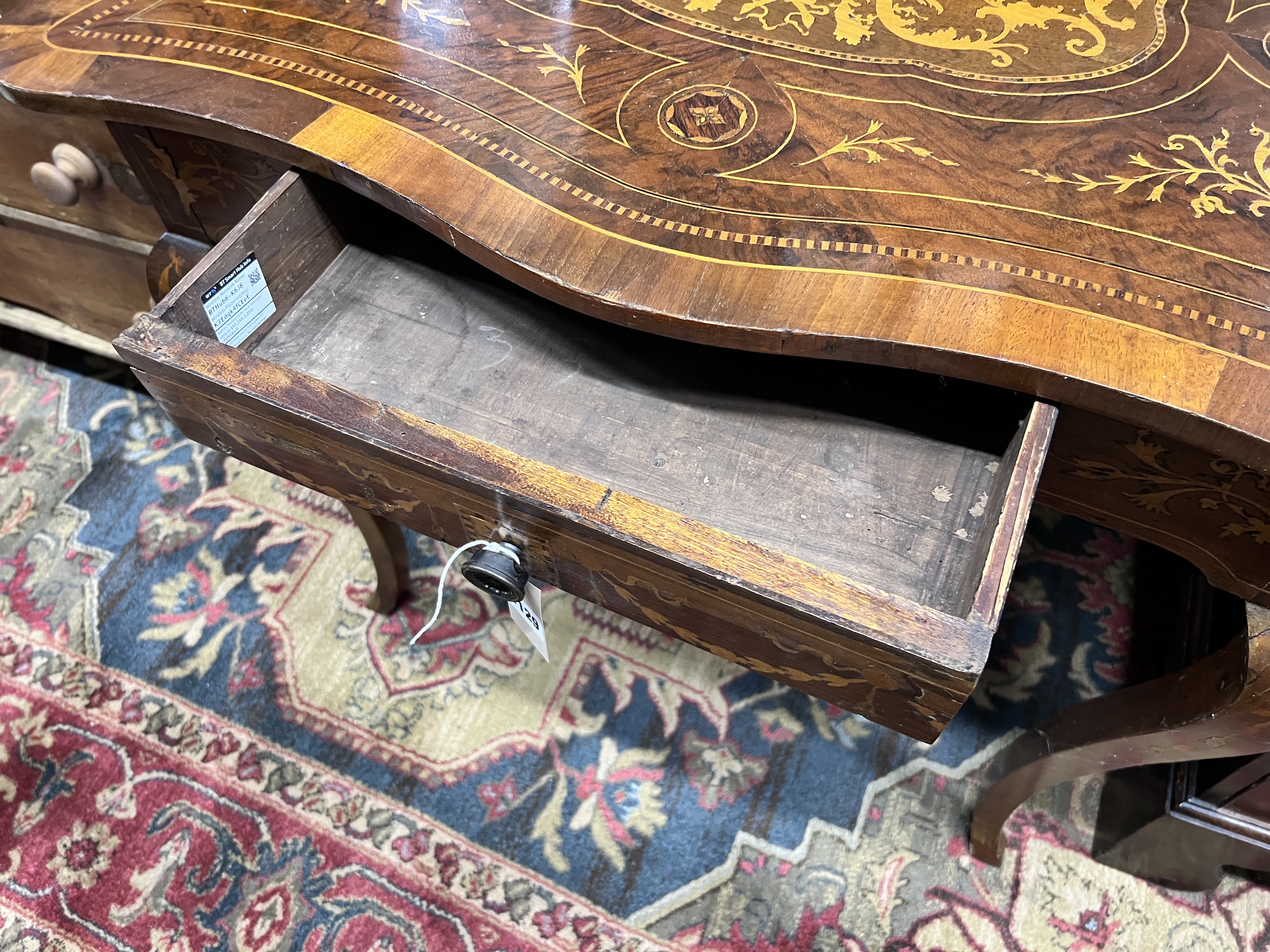 A 19th century Continental marquetry inlaid walnut occasional table, width 89cm